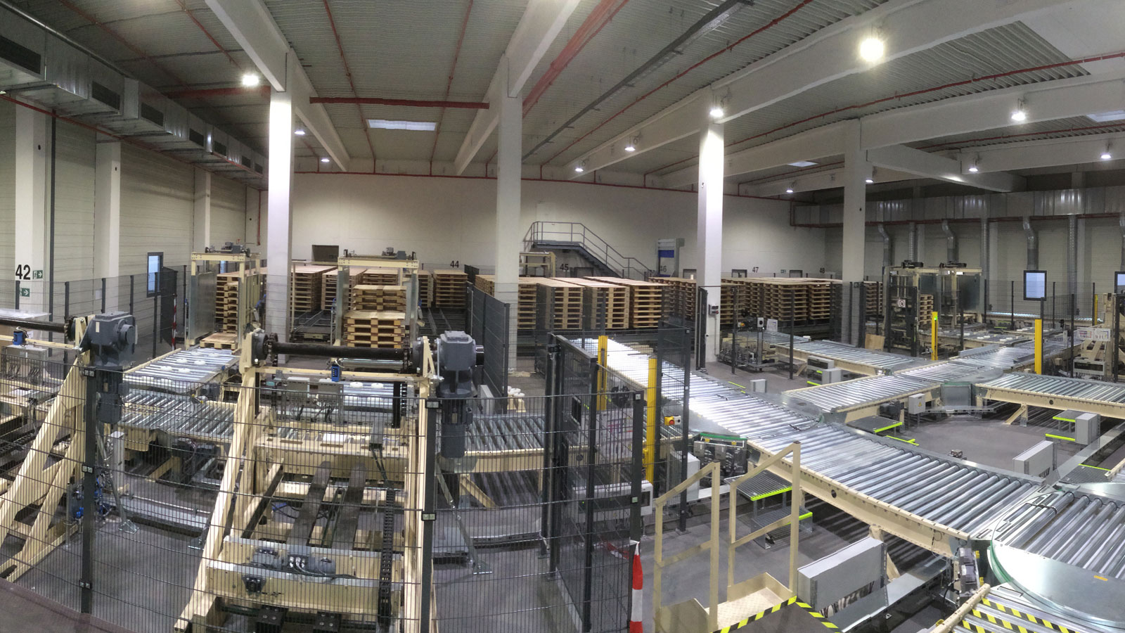 schwingshandl automation technology logistikzentrum koehler unterpalettierung systempaletten Kopie